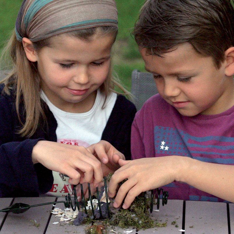 Ressort pour boules de graisses ou matériaux pour nid Natures Market -Oisillon.net-